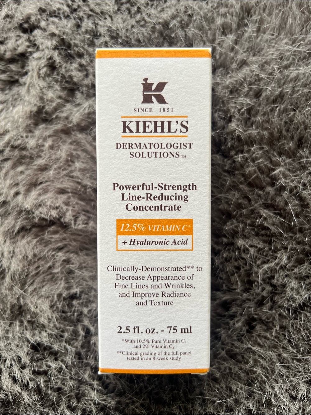 Kiehl's Powerful-Strength Line-Reducing Concentrate in White and Orange